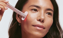 woman using solawave skincare wand 