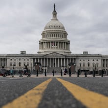 Clouds pass over the Capitol Dome