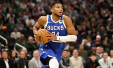 Giannis Antetokounmpo #34 of the Milwaukee Bucks handles the ball during a game against the Atlanta Hawks at Fiserv Forum on December 04, 2024 in Milwaukee, Wisconsin.