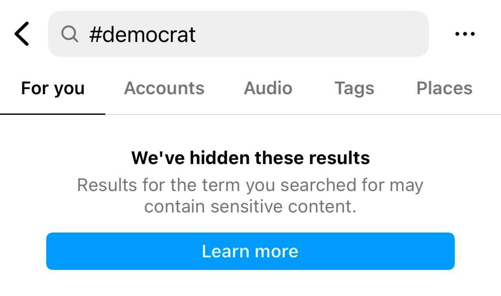 A screenshot from Instagram shows the "may contain sensitive content" warning page when searching for "#democrat".