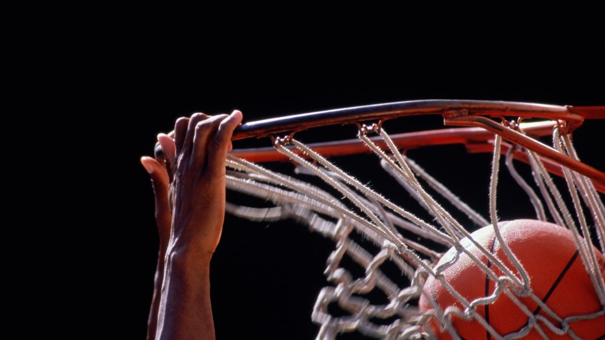 Basketball going through hoop