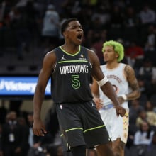 Anthony Edwards #5 of the Minnesota Timberwolves reacts after a basket against the San Antonio Spurs in the second half at Frost Bank Center on December 15, 2024 in San Antonio, Texas.