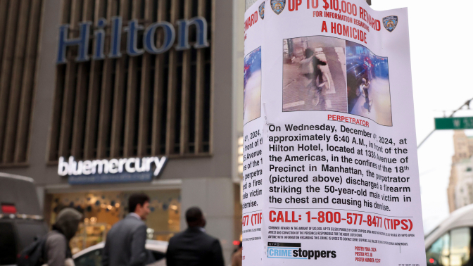 A New York Police Department (NYPD) flier outside the New York Hilton Midtown 