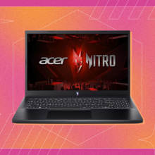 the acer nitro v 15 against a pink and orange gradient background