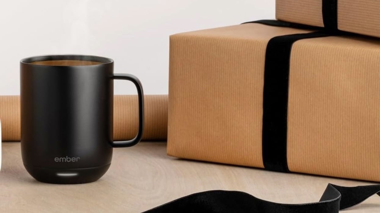 black ember mug 2 next to wrapped presents