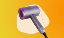 Multifunctional Electric Hair Dryer on a colorful background.