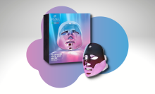 led face mask and box with colorful background