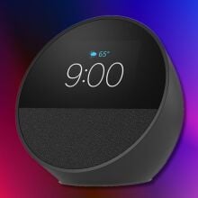 amazon echo spot smart alarm clock on a blue, black, and pink background