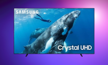 Samsung 98-inch DU9000 on a purple gradient background