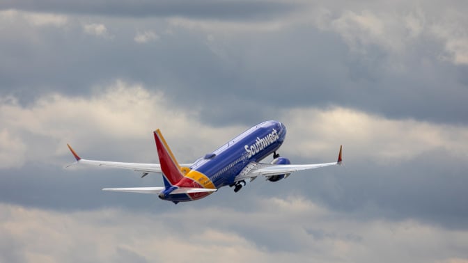 Southwest airplane in cloudy sky