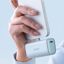 Person using Anker Nano portable charger