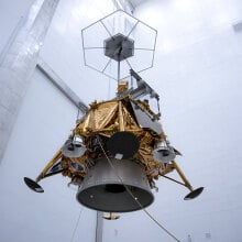 Firefly's Blue Ghost moon lander suspended in a cleanroom