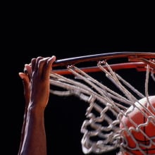 Basketball going through hoop