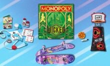 toys and games on a blue background including a melissa & doug play set, a monopoly game, nerf set, and skateboard