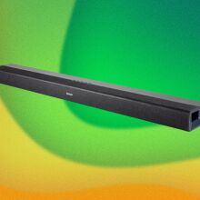 A Denon soundbar appears on a swirly green and yellow background.