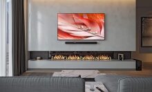 Sony HT-G700 soundbar mounted above living room fireplace