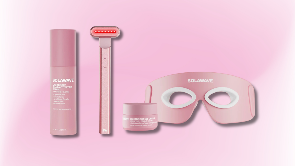 Four Solawave skincare products arranged on a pink background.