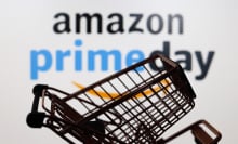 A shopping cart in front of a logo of Amazon Prime Day.