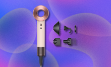 Dyson Supersonic Hair Dryer on purple and pink abstract background