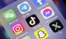 In this photo illustration, WeChat, Telegram, Facebook, Instagram,TikTok Messenger, Snapchat and X applications logos are displayed on the screen of an iPhone .