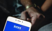 In this photo illustration, the Pornographic video sharing website Xnxx logo is seen displayed on an Android mobile device