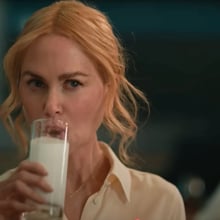 Nicole Kidman drinking a glass of milk, like a good girl, in the A24 movie 'babygirl'