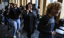 Choir members walk through an audience as they perform for We are Resilient: A Rally for George Floyd to celebrate his life. 