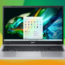 the acer aspire 3 against a green and yellow abstract background