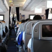 airplane waiting for take off from the perspective of an aisle seat