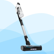 A white and black Levoit cordless stick vacuum cleaner against a blue background with stylized wave patterns.