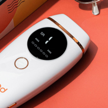 nood ipl laser hair removal device with salmon colored background