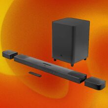 A multi-piece black, JBL soundbar appears on a swirly orange and yellow background.