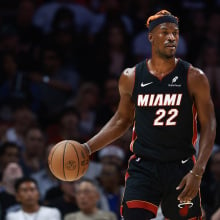 Jimmy Butler #22 of the Miami Heat controls the ball against the Oklahoma City Thunder during the first half at Kaseya Center on December 20, 2024 in Miami, Florida.