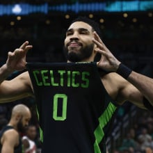 Jayson Tatum #0 of the Boston Celtics shows off his jersey to the fans before their game against the Toronto Raptors at TD Garden on December 31, 2024 in Boston, Massachusetts.