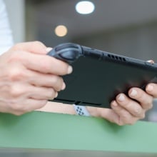 A black handheld gaming console