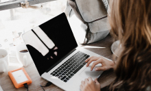 woman looking at laptop