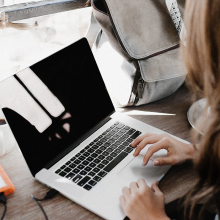 woman looking at laptop