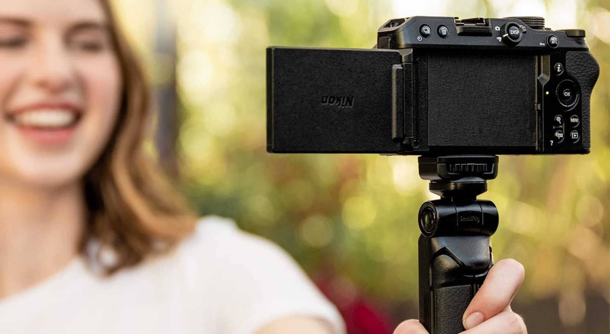 Woman filming herself using the Nikon Z 30