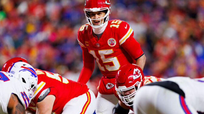 Patrick Mahomes adjusting a play at the line of scrimmage against the Buffalo Bills