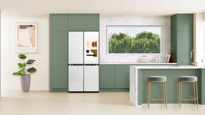 white samsung ai fridge pictured with cabinets in a full kitchen