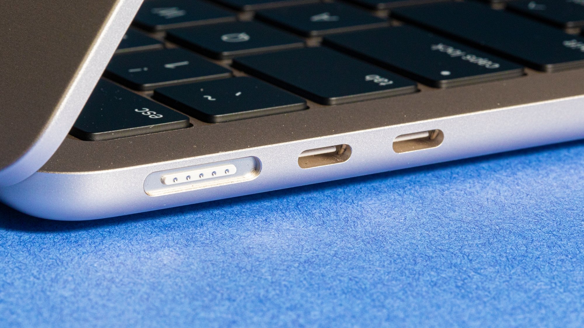 A view of the 2022 M2 MacBook Air's MagSafe charging port as well as Thunderbolt / USB-C ports