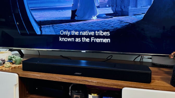 bose smart soundbar under TV playing 'dune'; text on screen reads 'only the native tribes known as fremen'