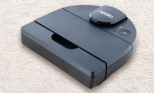 D-shaped robot vacuum on carpet