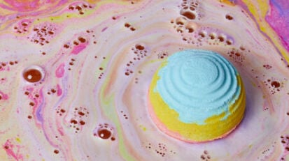 a lush bath bomb dissolving in water