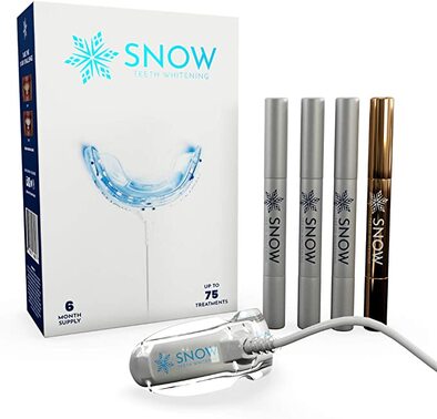 SNOW Teeth Whitening Kit with LED Light on a white background.