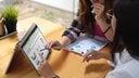 two women using Lenovo Yoga 9i