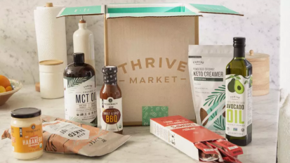 thrive market grocery bag surrounded by food