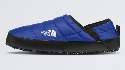 north face thermocell mules on white background