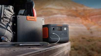 jackery explorer power station on back of pickup truck in desert