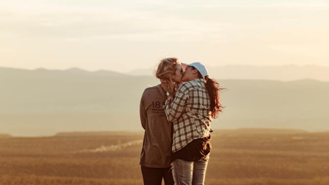 Two women kissing